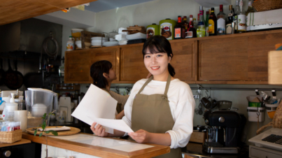 young-woman-arranging-her-cake-shop (1)