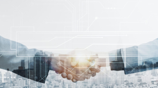 Business partners handshake global corporate with technology concept